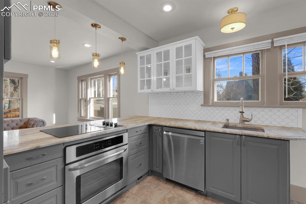 Image 8 of 39: All newer lights in kitchen