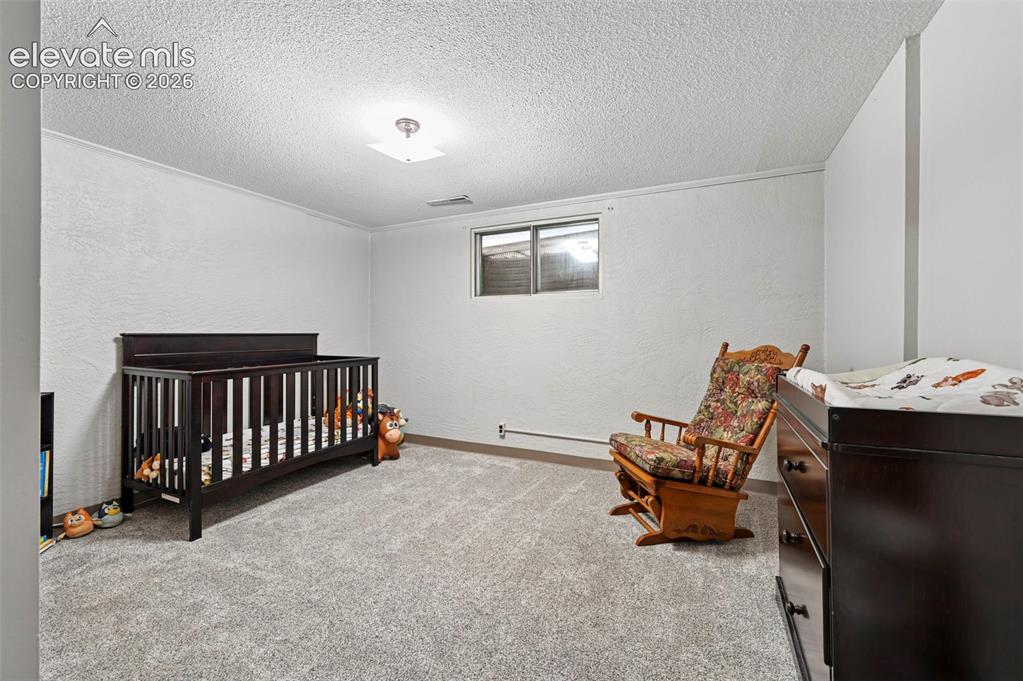 Image 16 of 22: Bedroom