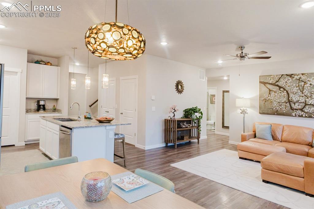 Image 10 of 37: The kitchen is open to the dining area and living room.