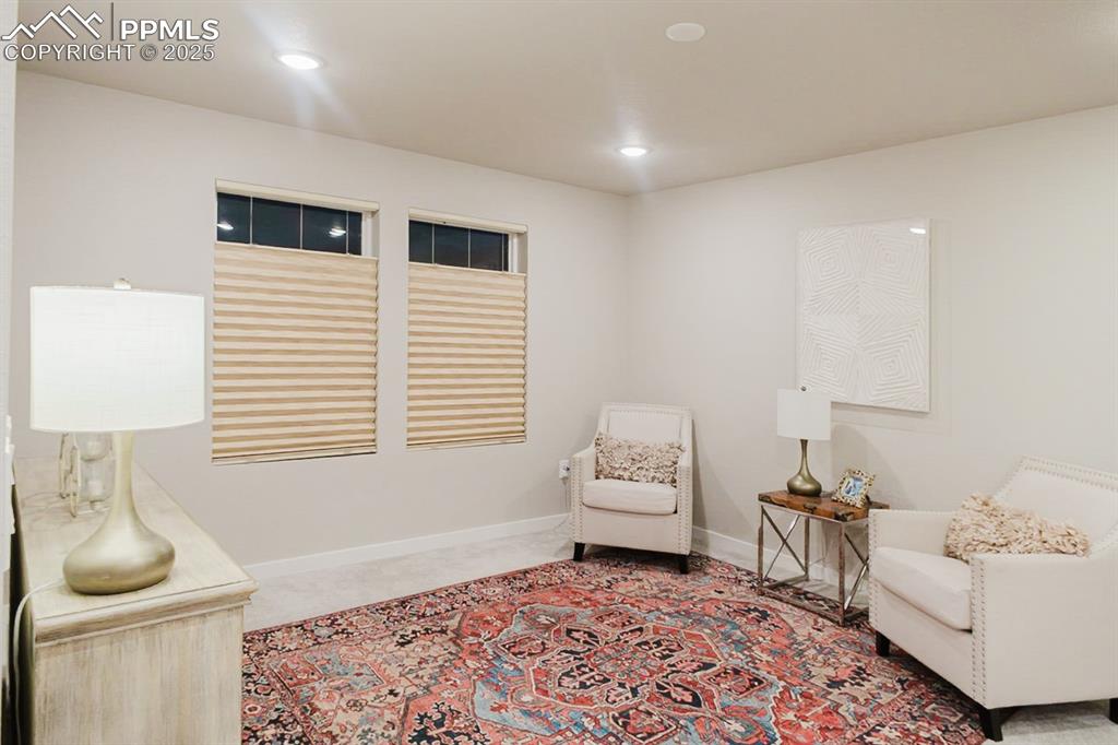 Image 16 of 37: This upstairs loft area is a great space for a library, office, homework st