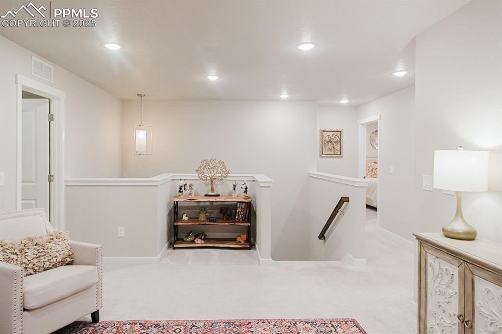 Image 17 of 37: The loft is spacious and elegant, with lots of natural light.