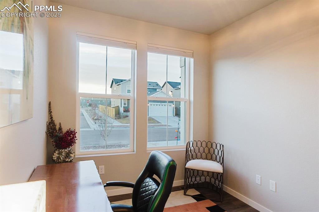 Image 5 of 37: Large windows fill the office with natural light.