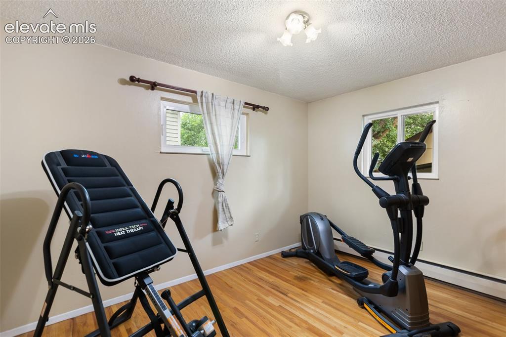 Image 17 of 36: Exercise room, main level bedroom2
