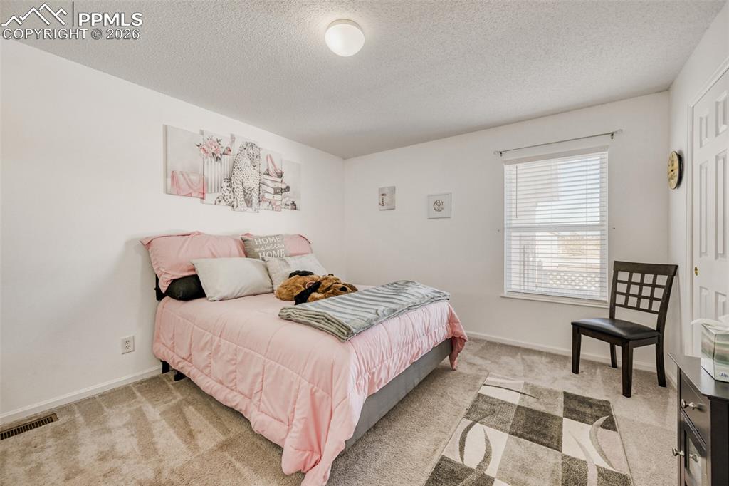 Image 20 of 37: 2nd Main Level Bedroom