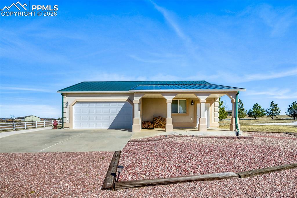 Image 5 of 37: Detached Garage and Workshop