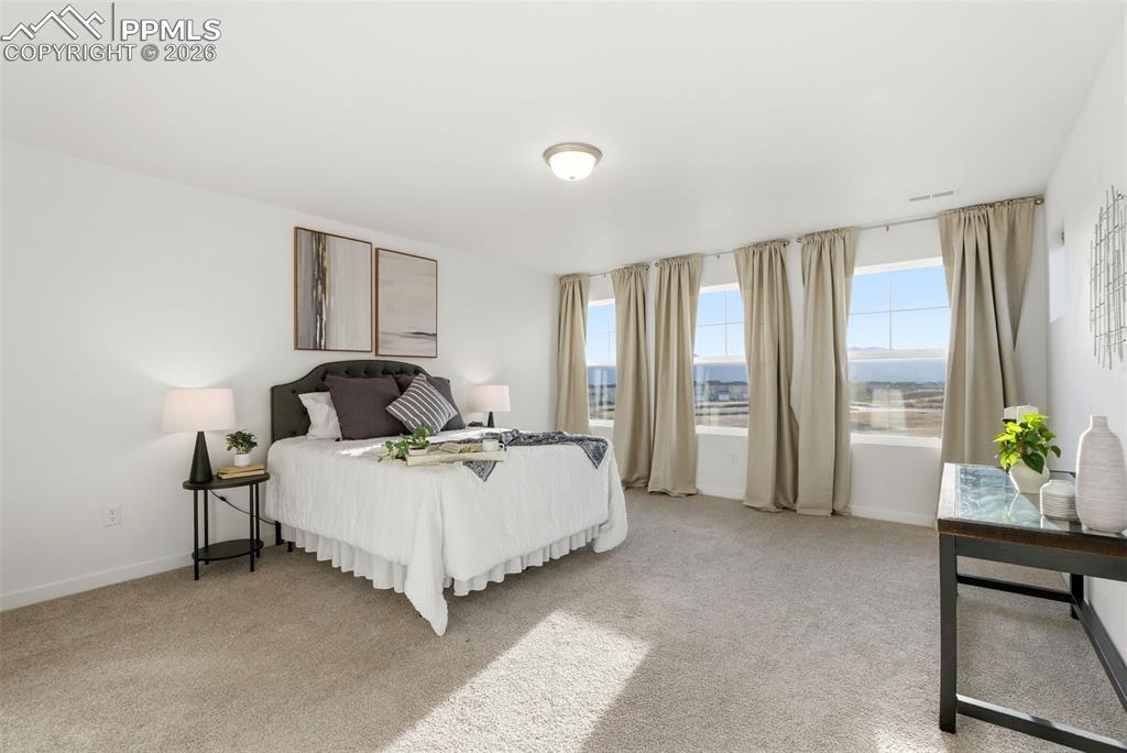 Image 23 of 50: Primary Bedroom