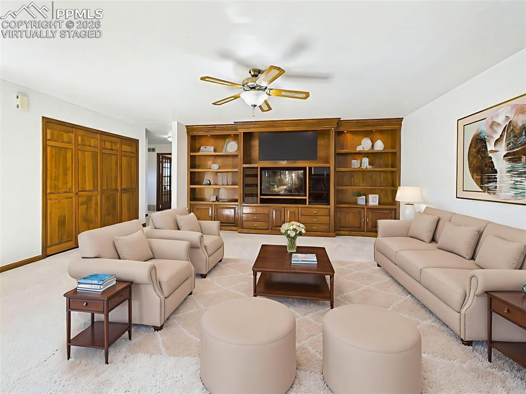 Image 14 of 50: Virtually Staged – This connected living space offers room for multiple fur