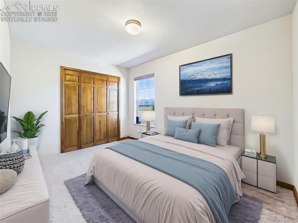 Image 24 of 50: Virtually Staged) – Spacious third bedroom virtually staged to show its ful