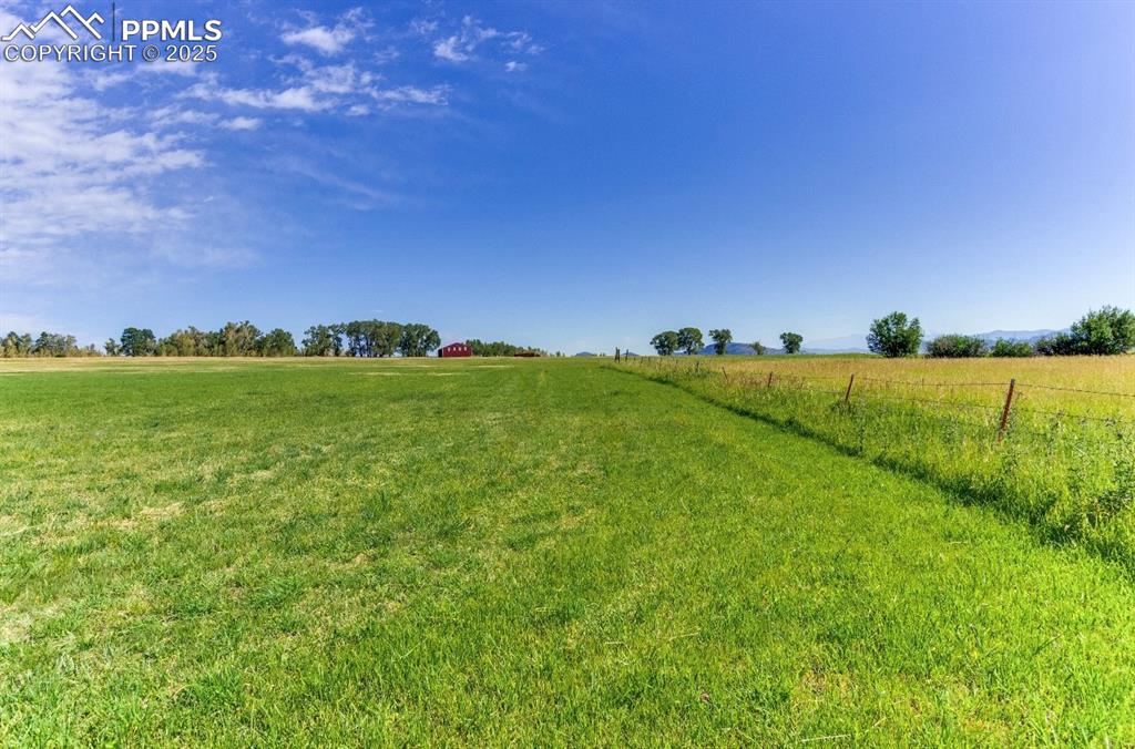 Image 4 of 26: View of yard with a view of rural / pastoral area