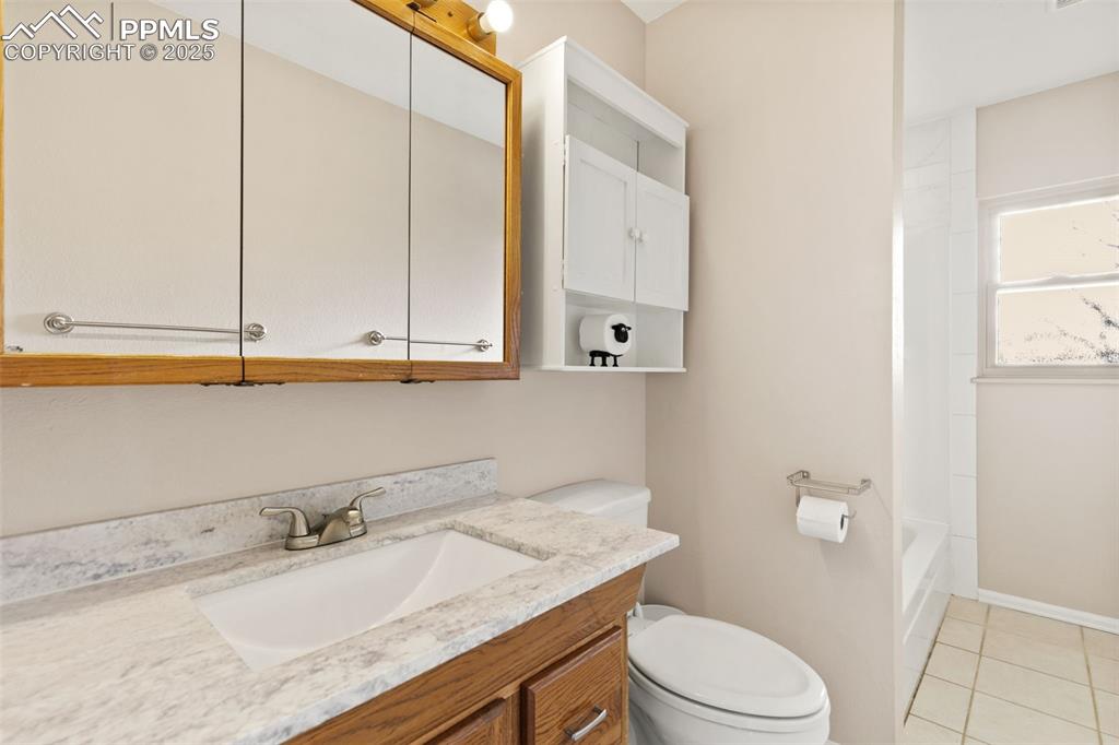 Image 10 of 27: bathroom upstairs