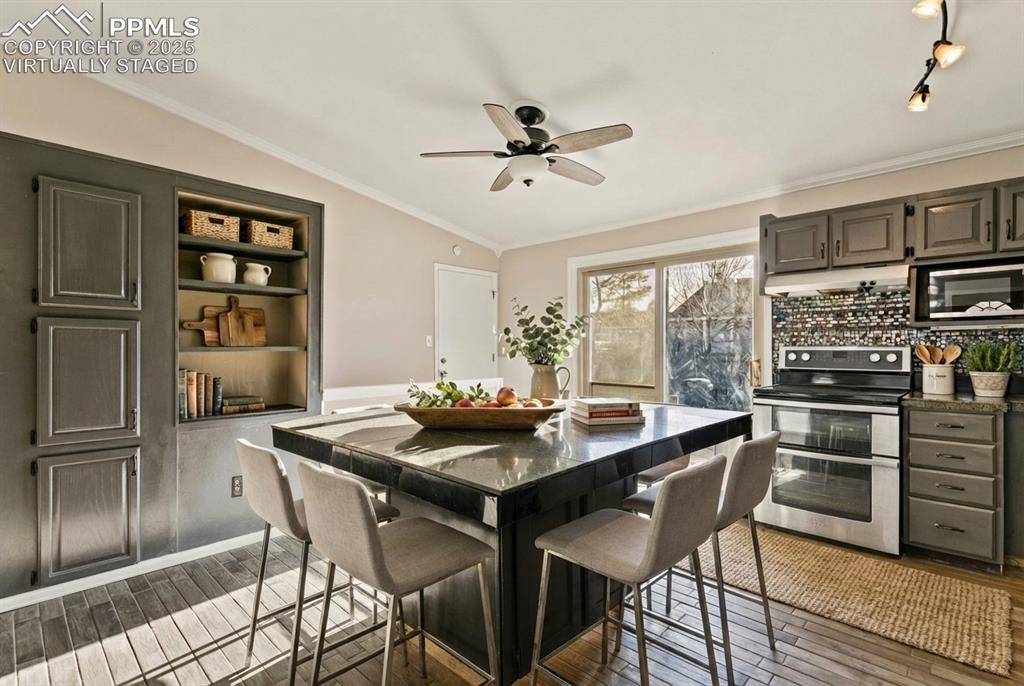 Image 7 of 27: Virtually staged dining area in kitchen