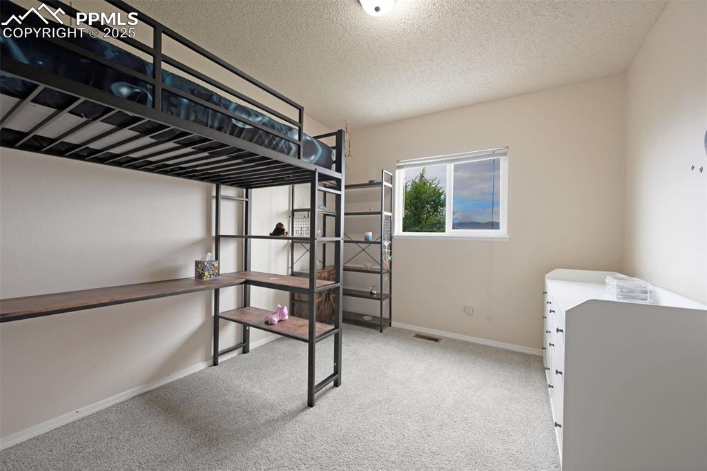 Image 25 of 50: Bedroom