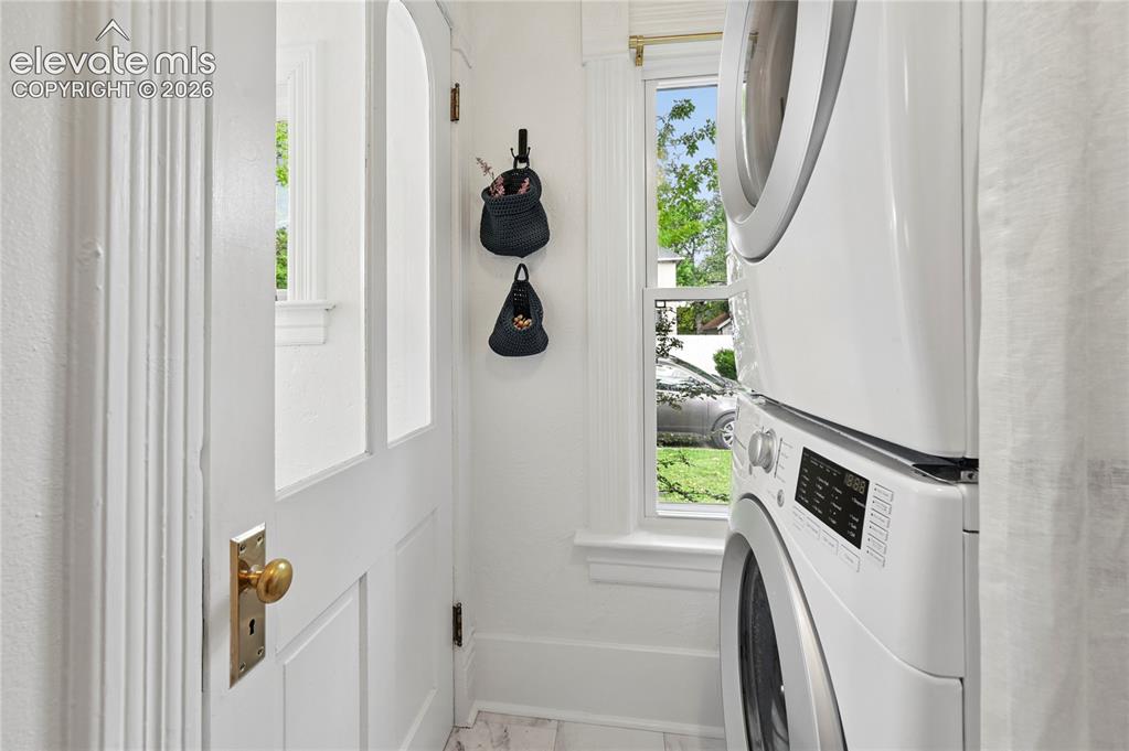 Image 20 of 47: Laundry Area looking toward door to the Basement