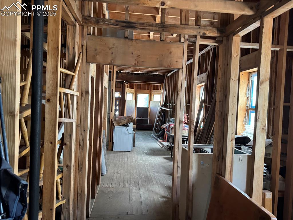 Image 17 of 19: Misc room featuring hardwood / wood-style floors