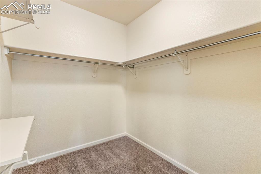 Image 16 of 26: Walk in Primary Closet