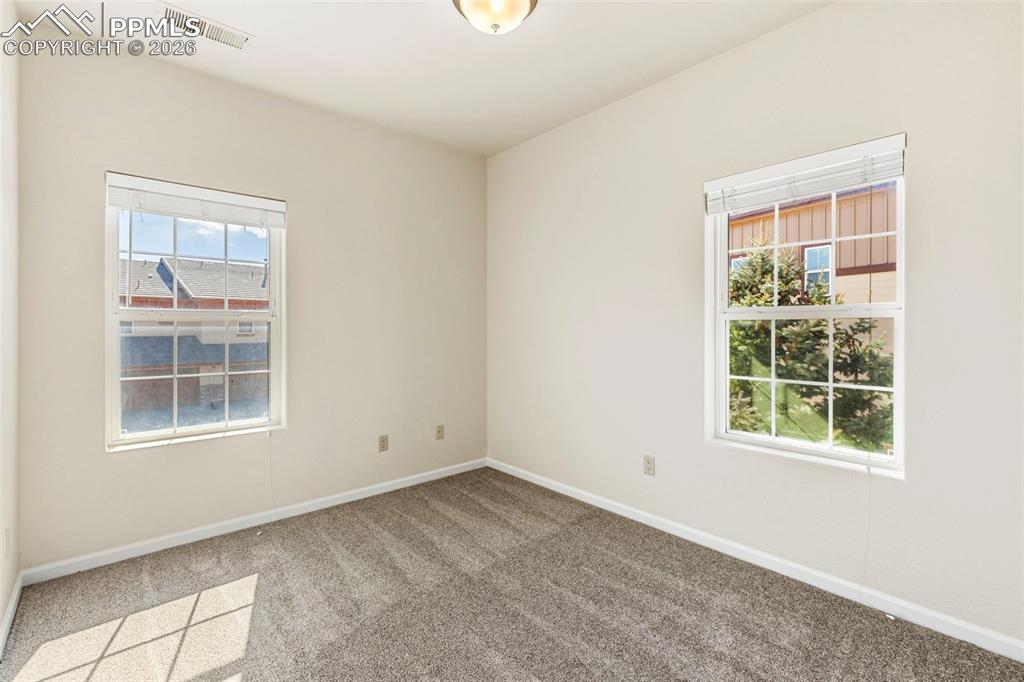 Image 19 of 26: Bedroom