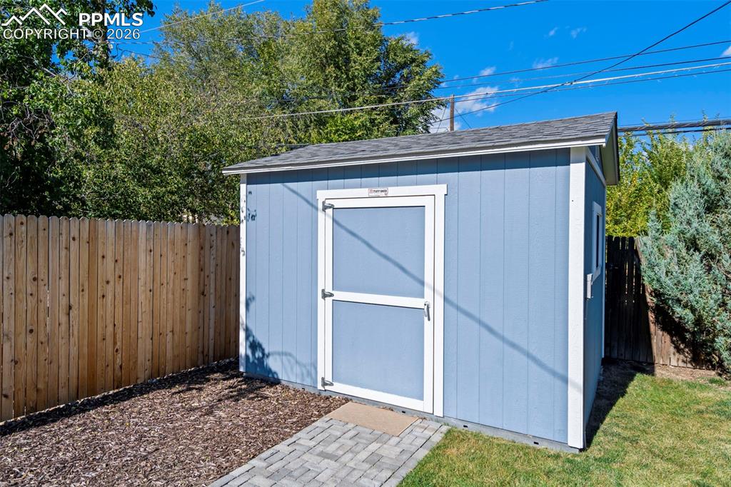 Image 36 of 49: Newer Shed with Power