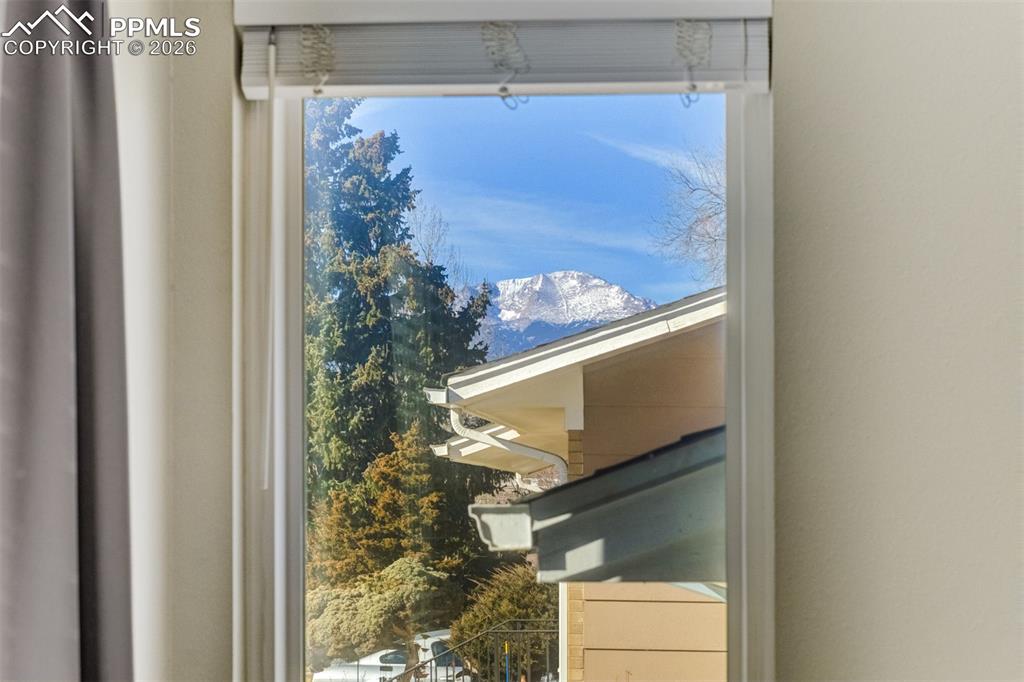 Image 7 of 49: View out Side Living Room Window