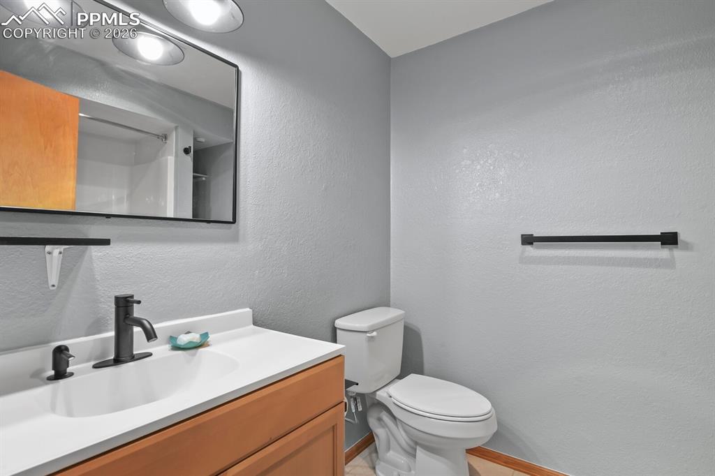 Image 28 of 37: Basement Full bathroom featuring a vanity, and a Tub/shower