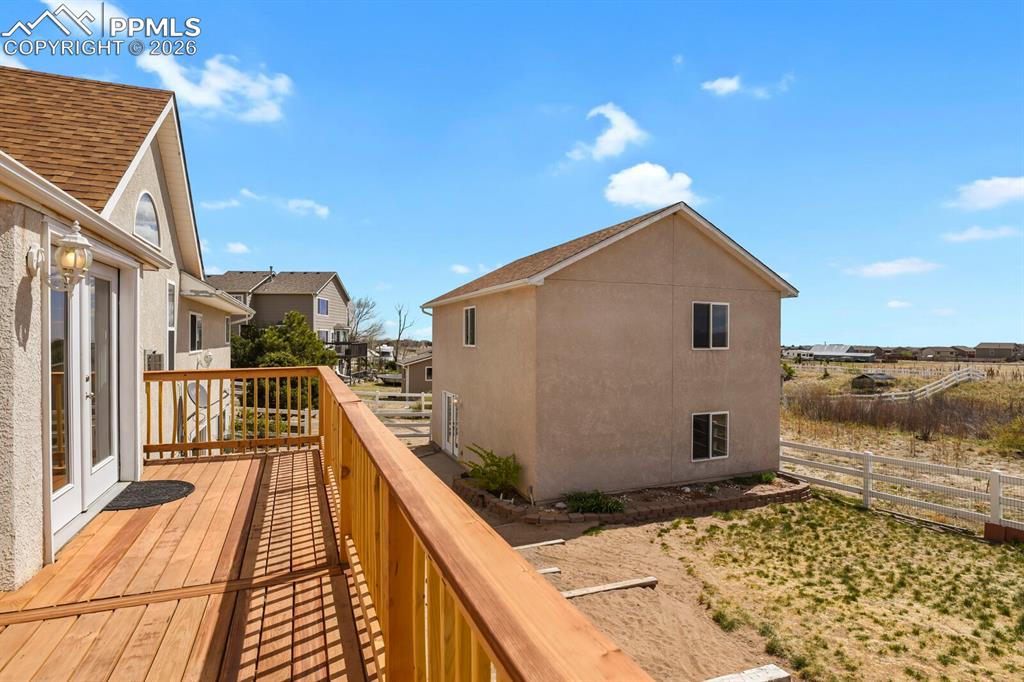 Image 30 of 37: Deck featuring a residential and Mountain views