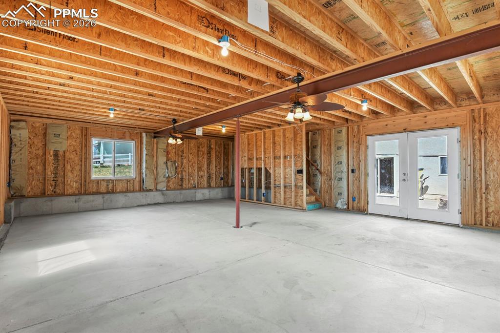 Image 33 of 37: Rear Unfinished Building is 775 sq ft on the main and 725 sq ft on the Uppe