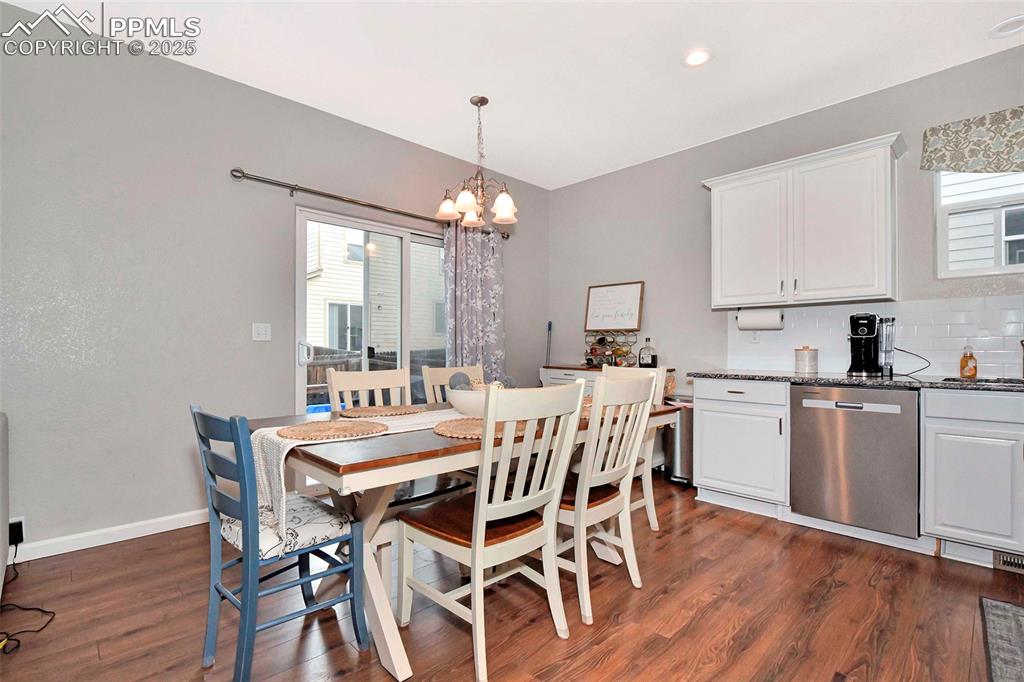 Image 11 of 28: Dining area has walk out to ...