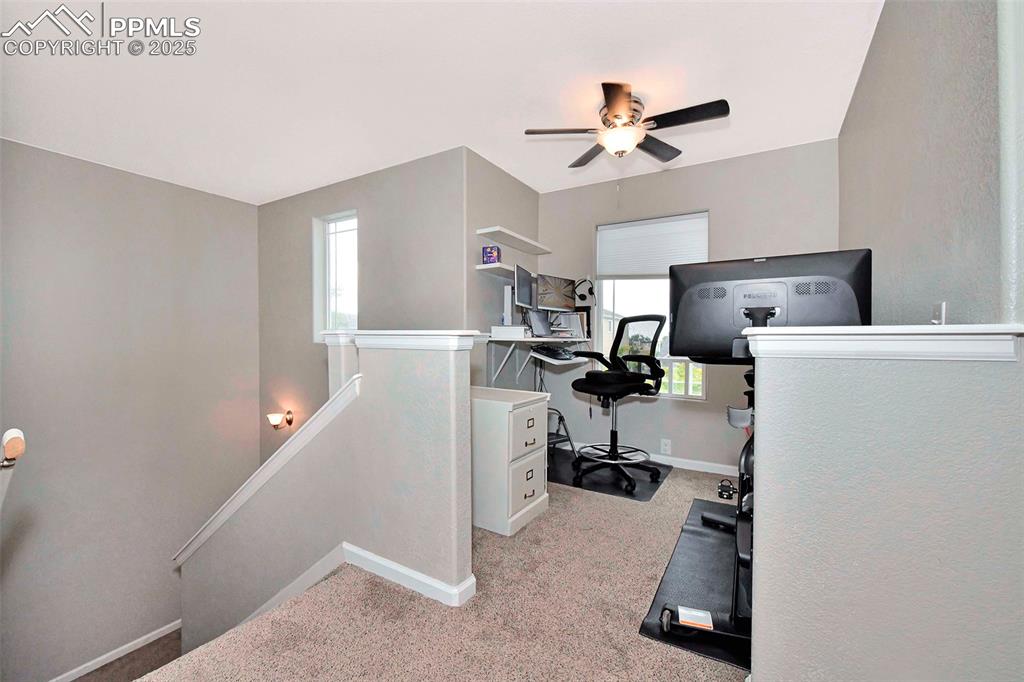 Image 13 of 28: loft area has pony wall