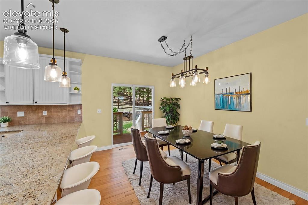 Image 14 of 50: Virtually Staged Formal Dining