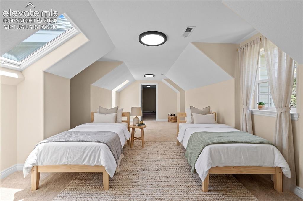 Image 25 of 50: Virtually Staged Upper Bedroom