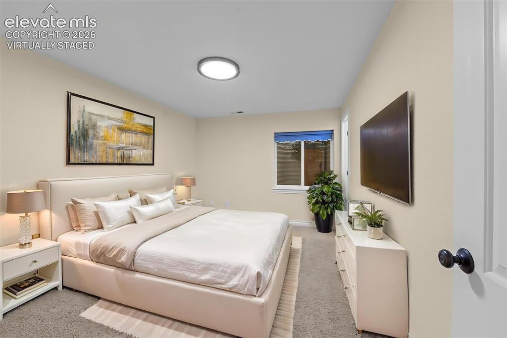 Image 36 of 50: Virtually Staged Lower Bedroom