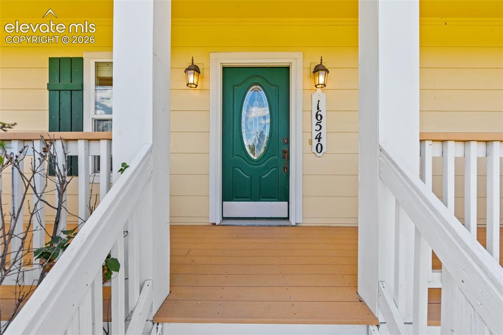 Image 5 of 50: Welcoming Front Entry