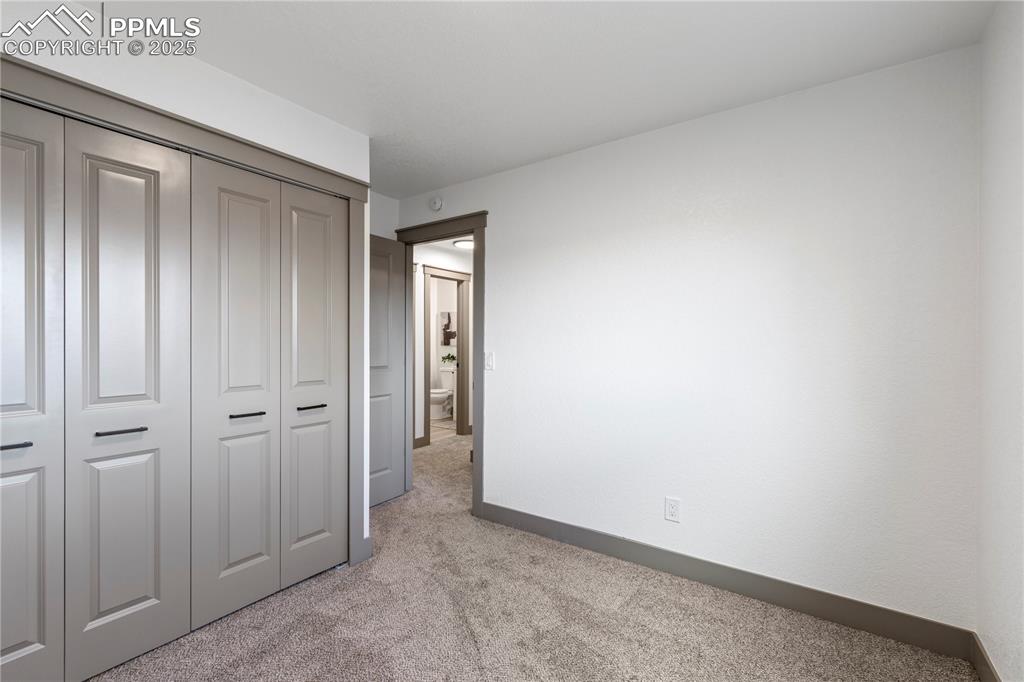 Image 20 of 26: Bedroom