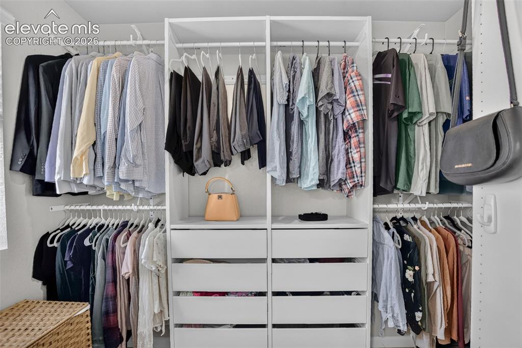 Image 37 of 44: Primary Closet