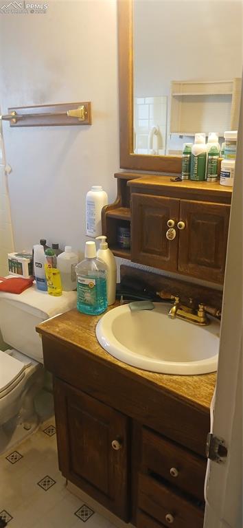 Image 12 of 33: Bathroom featuring vanity and toilet