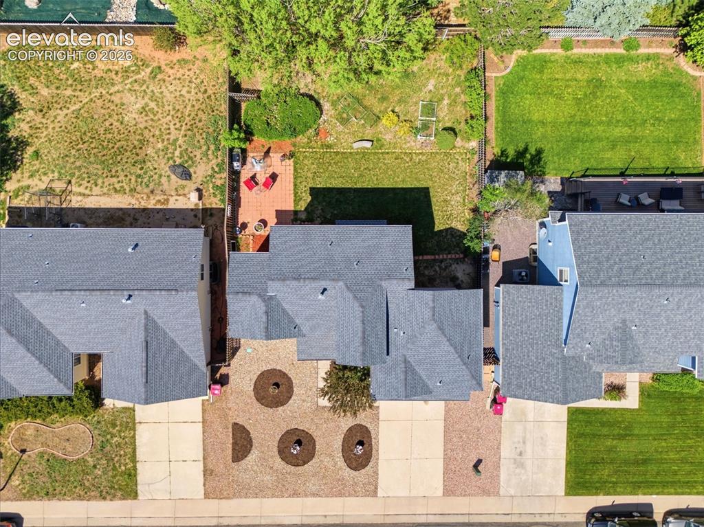 Image 34 of 37: Aerial representation of a residential property featuring a gray shingled r