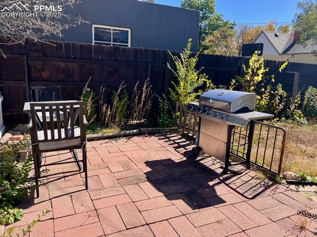 Image 17 of 25: View of patio / terrace featuring area for grilling