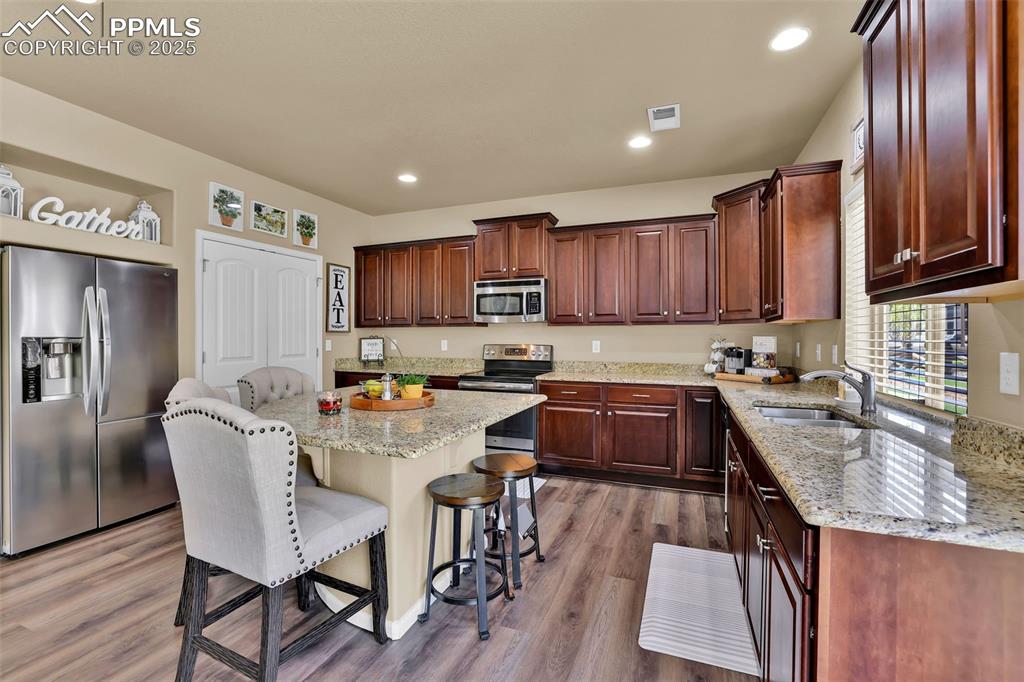 Image 13 of 50: all kitchen stainless appliances
