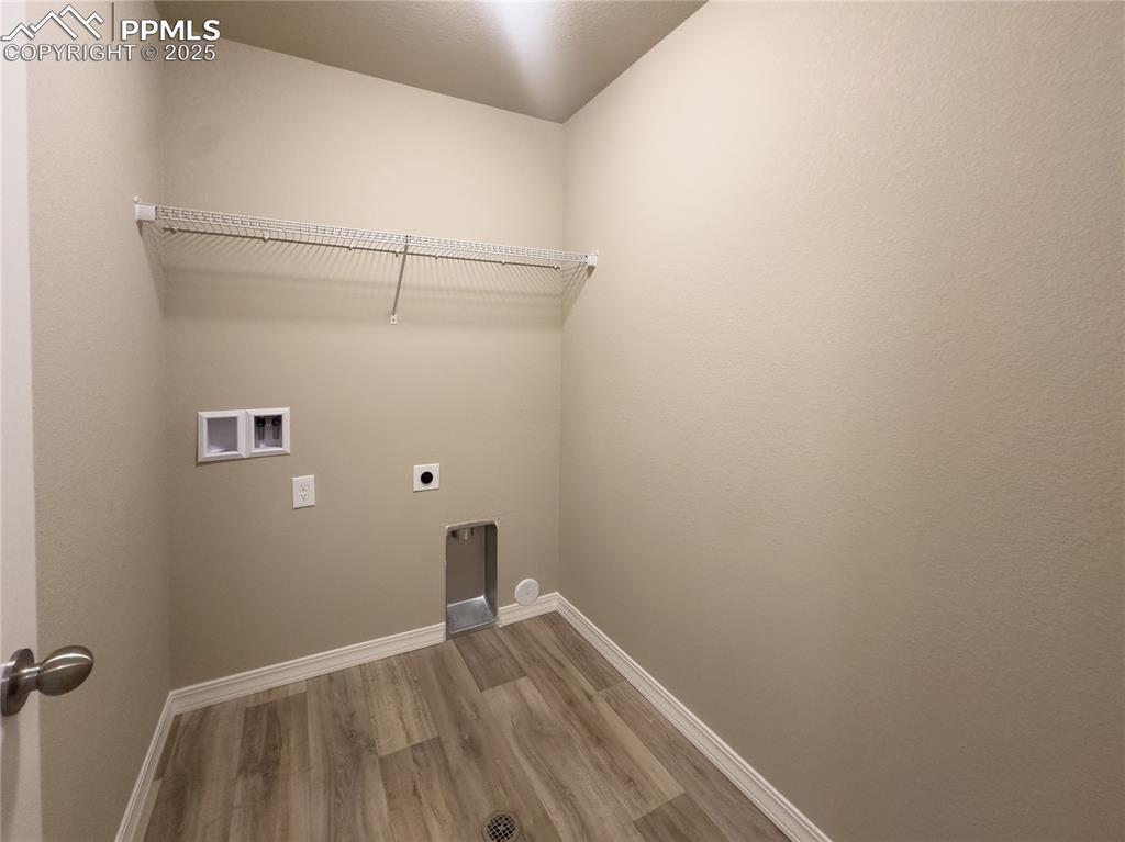 Image 15 of 25: Main level laundry