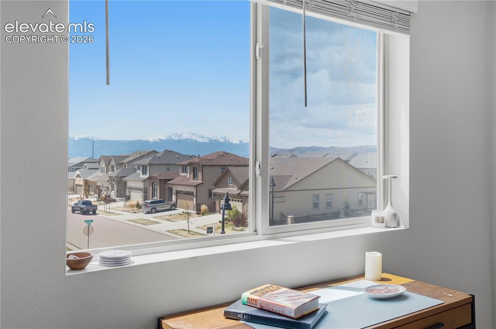 Image 36 of 48: Views of the front range and Pikes Peak from the loft.