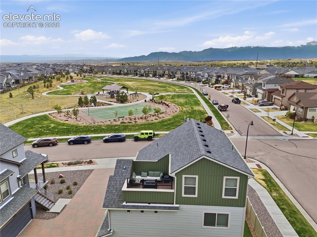 Image 47 of 48: Aerial perspective showcasing a modern neighborhood with an integrated comm