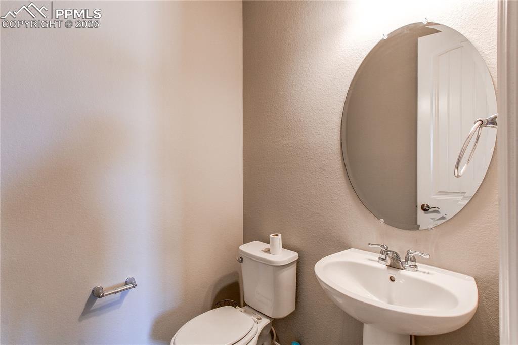 Image 41 of 49: Bathroom featuring a textured wall