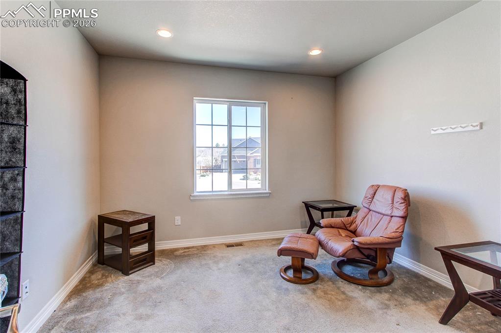 Image 42 of 49: Sitting room featuring carpet floors and recessed lighting