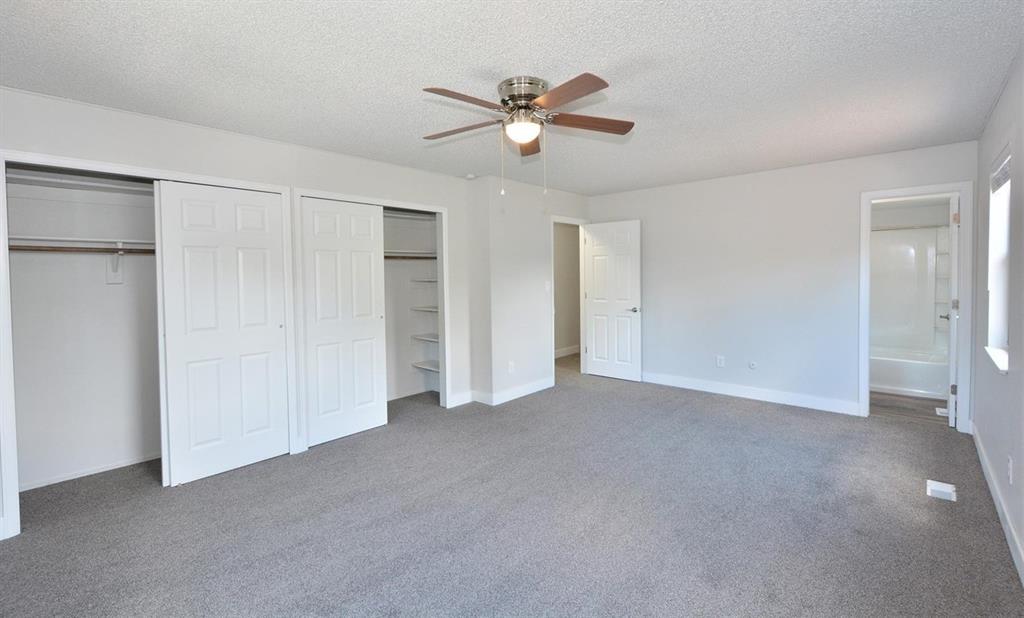 Image 13 of 26: Master Bedroom