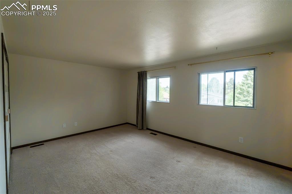 Image 14 of 45: Primary Bedroom 