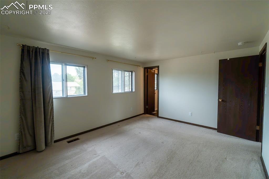 Image 16 of 45: Primary Bedroom