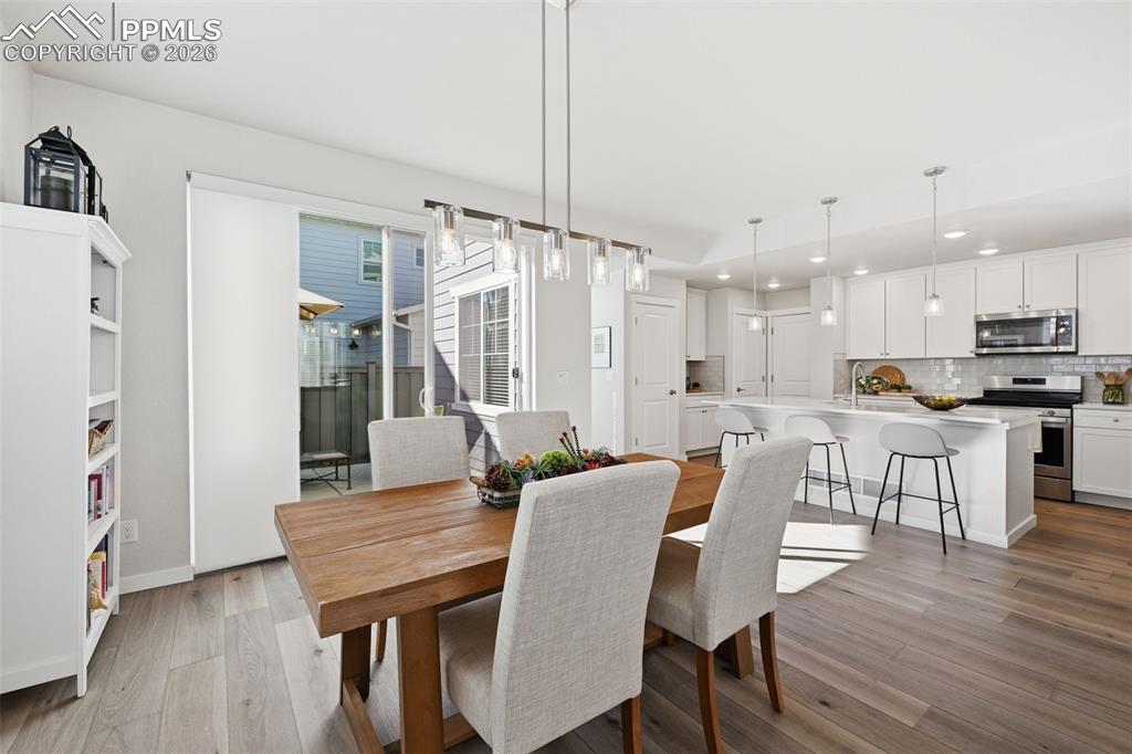 Image 13 of 32: Open to kitchen