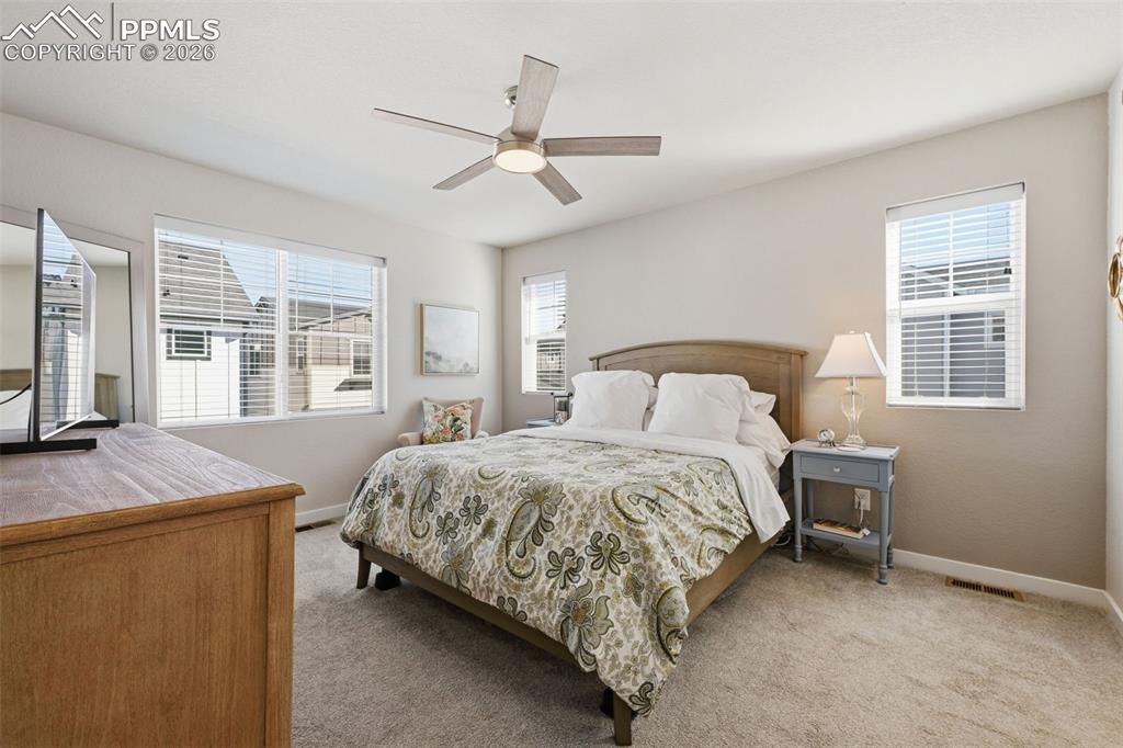 Image 21 of 32: Large Master Suite with tons of natural light!