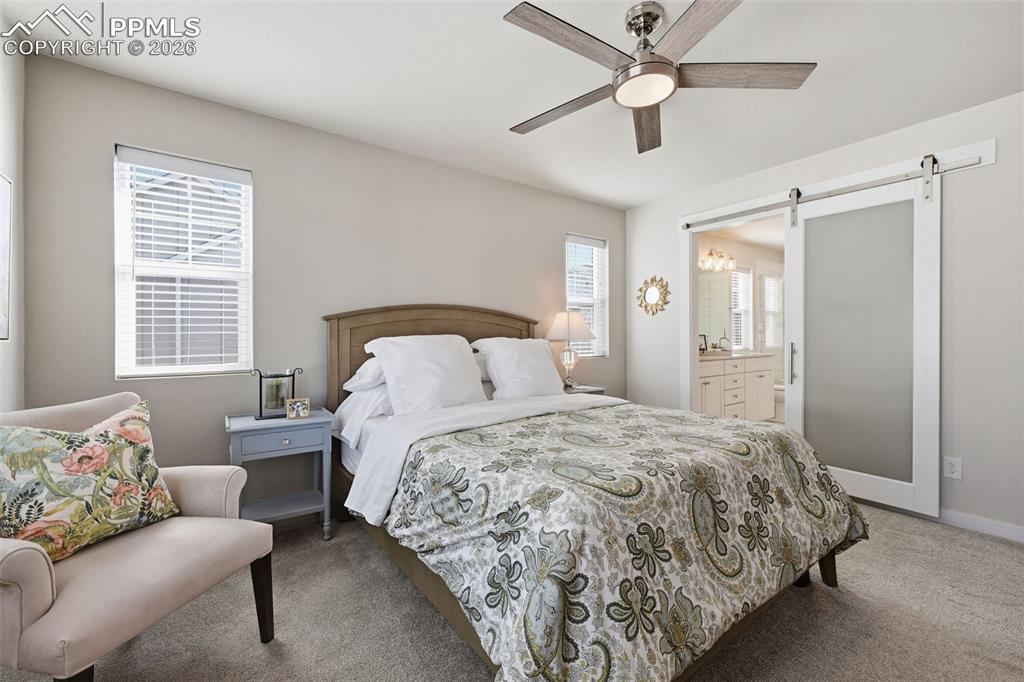 Image 22 of 32: Connects to Master Bath through upgraded barn door!