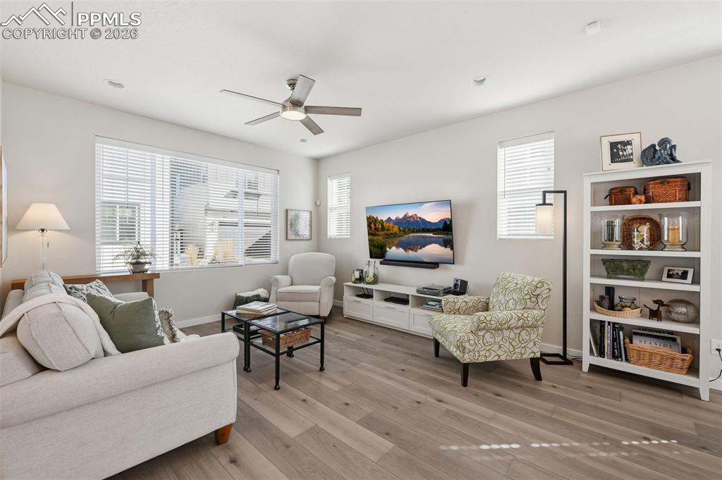 Image 6 of 32: Large family room with tons of natural light