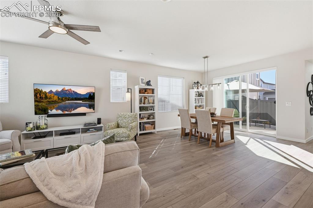 Image 7 of 32: Open concept to the dining and kitchen